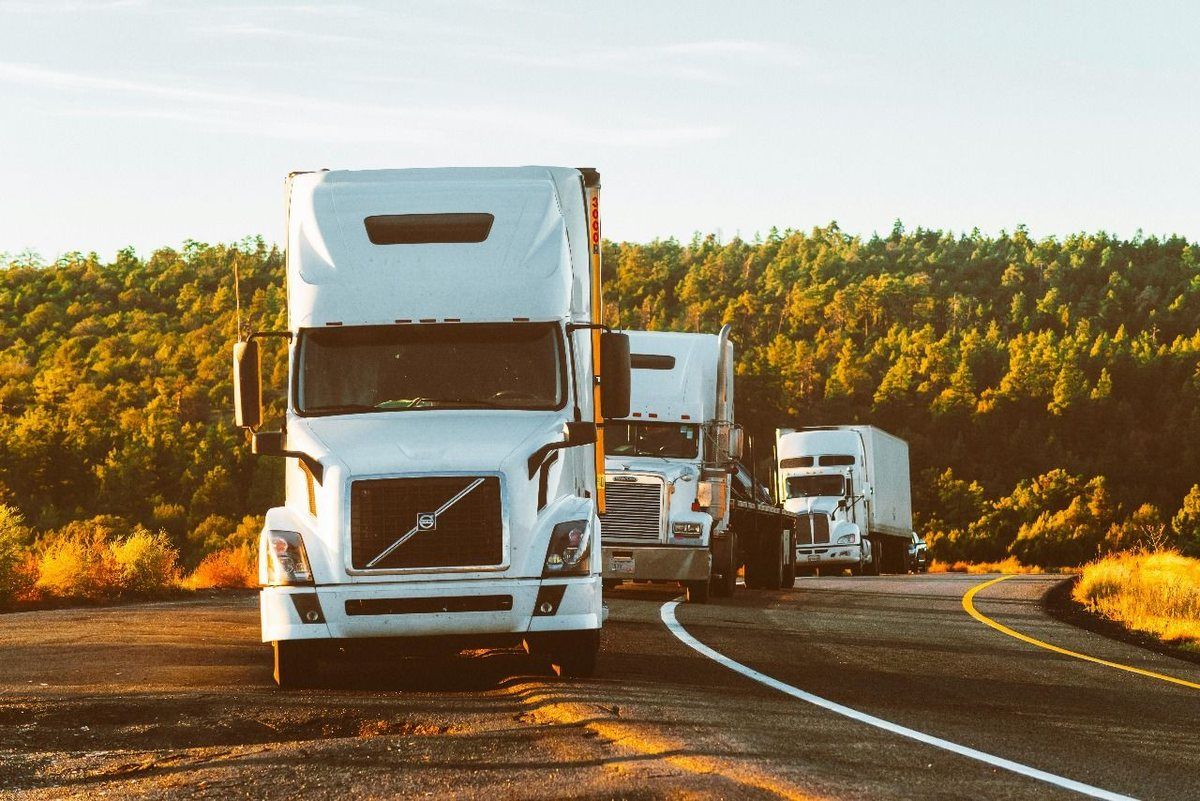 Container trucks carrying export goods